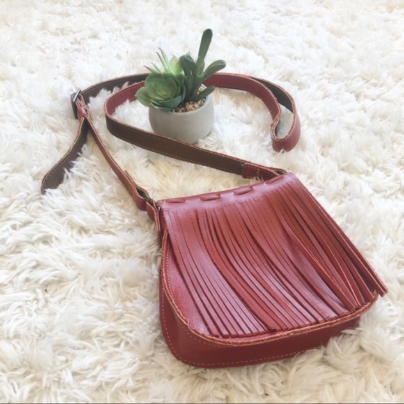 Minnetonka Handbags - Minnetonka Leather Fringe Crossbody Purse in Rust